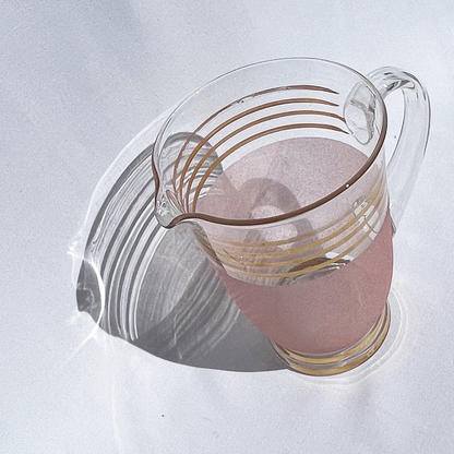 Pink and gold striped art deco style glass jug