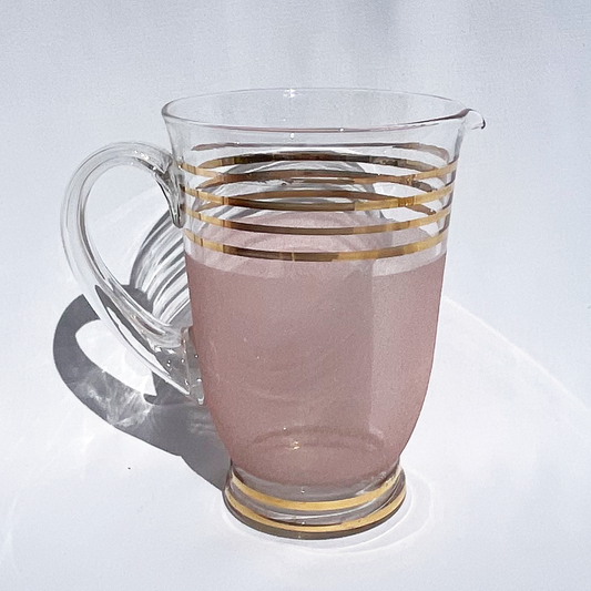 Pink and gold striped art deco style glass jug
